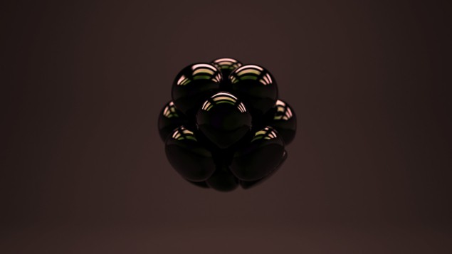 Dark matter Image of a group of dark spheres balled together against a dark background