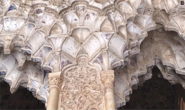 Alhambra decorations Photo of muqarnas - tiny, arched cavities nested together like a honeycomb - at the Alhambra, showing the purple discolouration on the surface.