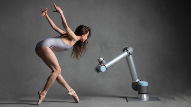 Merritt Moore dancing with a robot Merritt Moore dancing with a robot