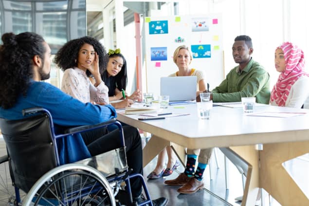 Wheelchair user in a meeting Wheelchair user in a meeting